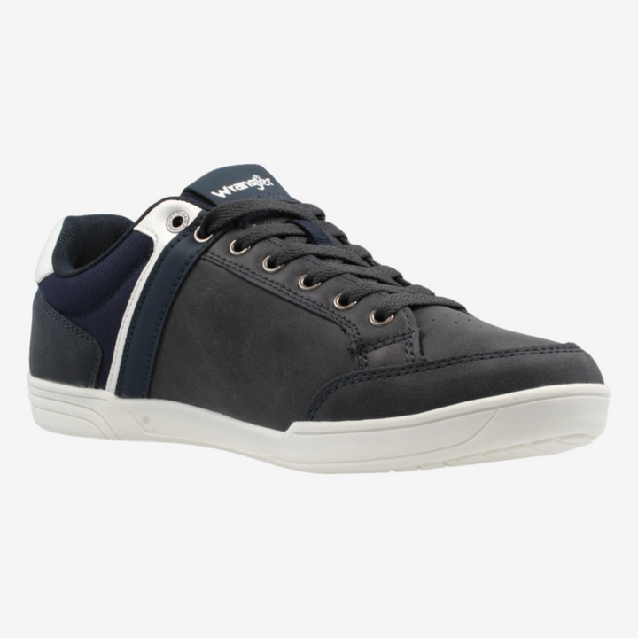 Black sneaker with white sole on a light gray background